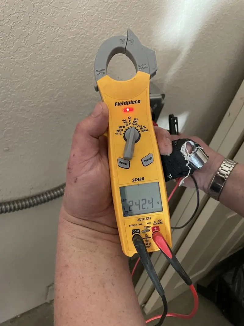 Voltage testing with clamp meter during Generator Installation in Topanga